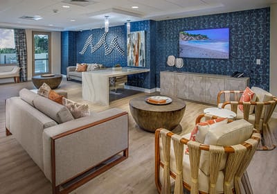 Bright common area with modern furnishings and artwork
