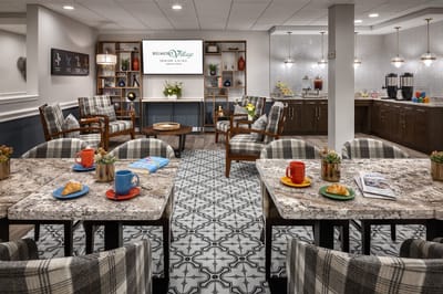 Common area with seating and refreshments for residents