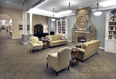 Cozy lounge area with armchairs and a fireplace
