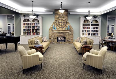 Cozy common area with seating and a fireplace