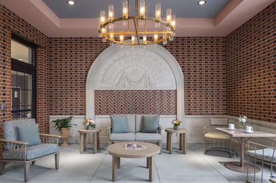 Common area with seating and decorative lighting
