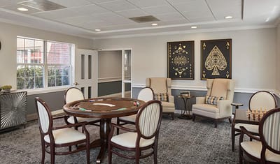 Activity room with card tables and seating