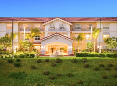 Exterior view of Belmont Village facility at dusk