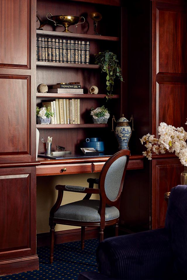 Cozy reading nook with bookshelf and desk