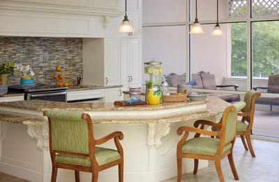 Bright and welcoming kitchen area with seating.