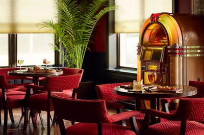 Cozy interior space with jukebox and dining tables
