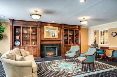 Cozy common area with furniture and a fireplace