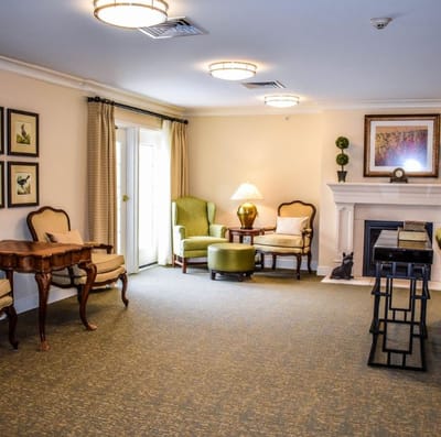 Lounge area with seating and a fireplace