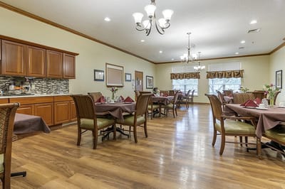 Bright dining area with tables set for meals