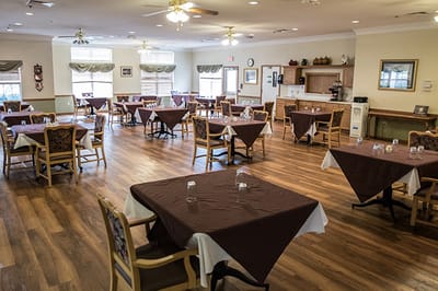Dining area with tables set for meals