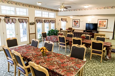 Interior dining area with tables and chairs