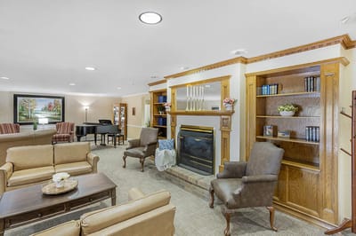 Common area with seating and a fireplace