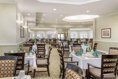 Dining room with tables set for a meal