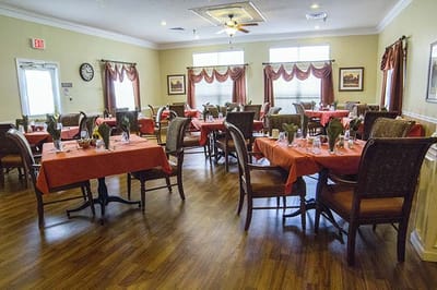 Dining area with tables set for a meal