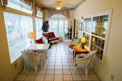 Bright common area with seating and natural light