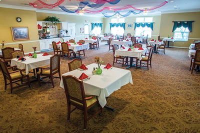 Dining area with table settings and decor