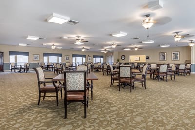 Spacious dining area with tables and chairs