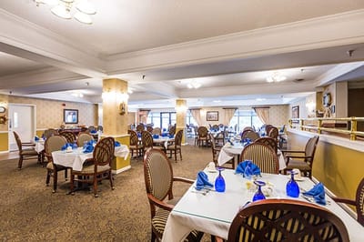 Dining area with tables set for a meal