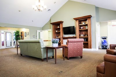 Common area with seating and television