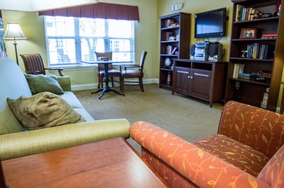 Cozy living area with seating and a television