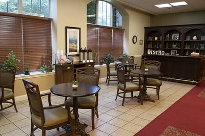 Cozy bistro area with seating and decor