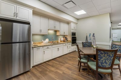 Interior kitchen area with dining table and chairs