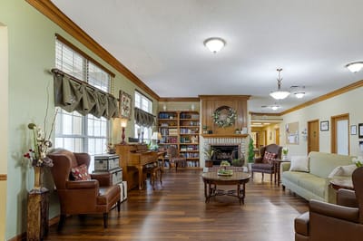 Interior common area with seating and bookshelves