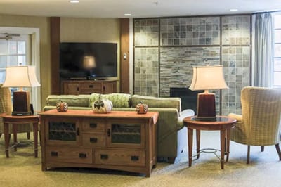 Bright common area with comfortable seating and decor