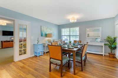 Bright dining room with a set table