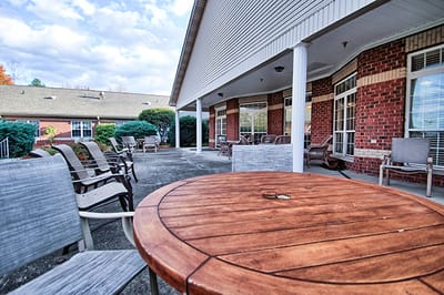 Outdoor seating area with tables and chairs