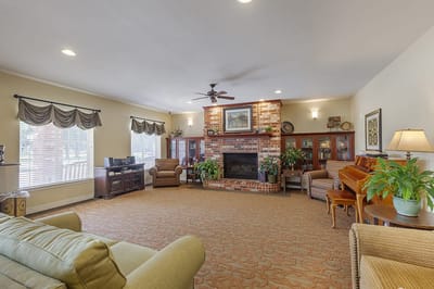 Cozy common area with seating and a fireplace