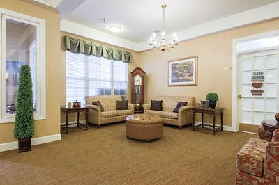 Bright common area with seating and decor
