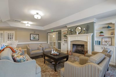 Comfortable common area with seating and fireplace