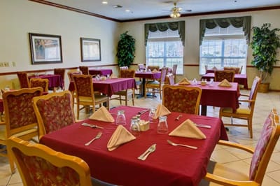 Dining room set up with tables and chairs