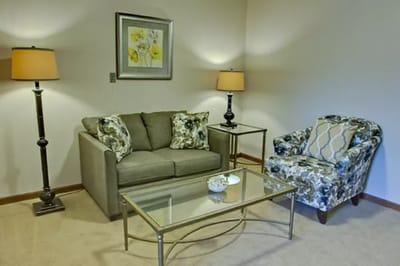 Cozy living room with couch and lamps