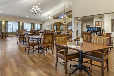 Dining room with tables and chairs in a well-lit space