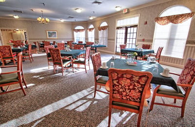 Bright dining room with decorated tables and chairs
