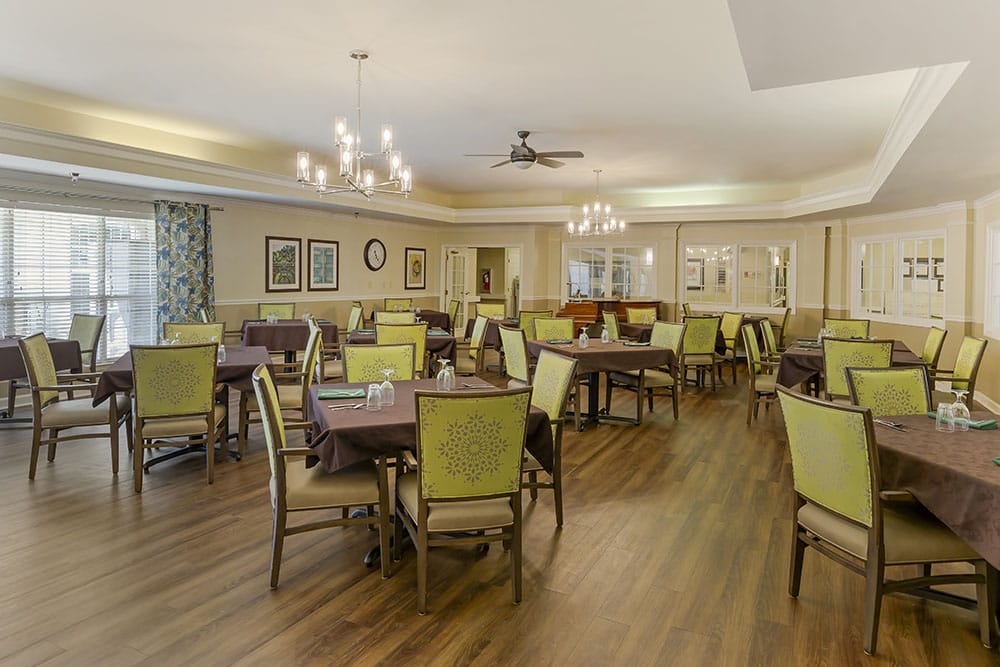 Bright dining room set with tables and chairs