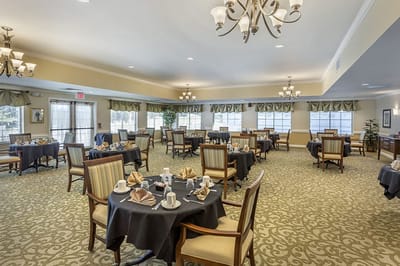 Dining room set up for a meal in the facility