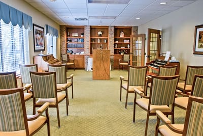 Bright common area with chairs arranged for an event