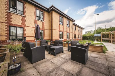 Outdoor seating area with chairs and tables