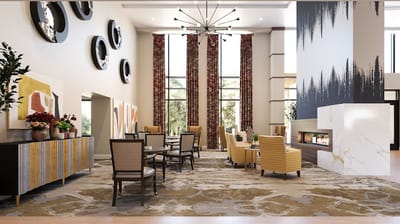 Bright interior common area with seating and decor