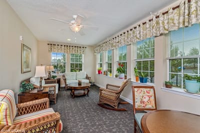 Bright common area with seating and plants