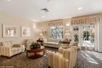 Cozy common area with seating and natural light