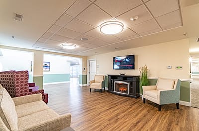 Common area with seating and a fireplace