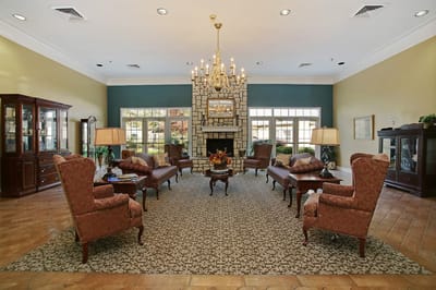 Cozy lounge area with comfortable seating and a fireplace