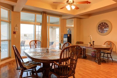 Dining area with wooden tables and chairs