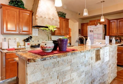 Bright kitchen space with plants and countertops