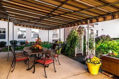 Outdoor seating area with flowers and decorations
