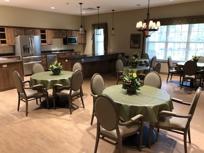 Bright dining area with tables and chairs